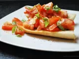 Rezept Lauwarmer tomatensalat auf knusprigem kräuterbaguette