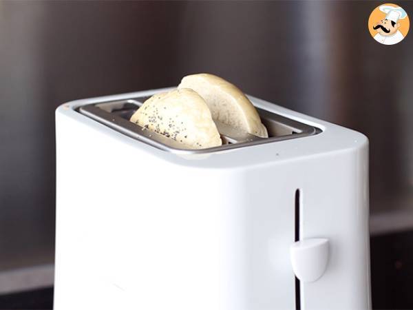 Bagel mit Lachs, Gurke und Frischkäse - Zubereitung Schritt 1