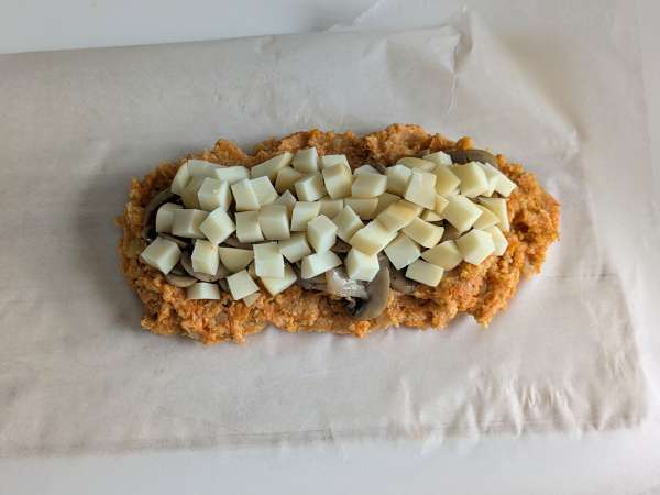 Kürbis-Hackbraten mit Champignons und Scamorza-Käse: leckeres und einfaches Rezept zum Überbacken - Zubereitung Schritt 9