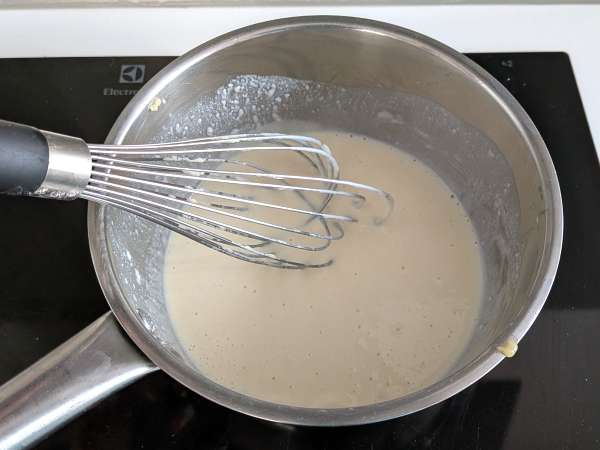 Crespelle mit Ricotta und Pilzen: das perfekte cremige vegetarische Rezept für jede Gelegenheit - Zubereitung Schritt 7