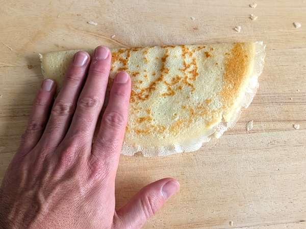 Crespelle mit Ricotta und Pilzen: das perfekte cremige vegetarische Rezept für jede Gelegenheit - Zubereitung Schritt 9