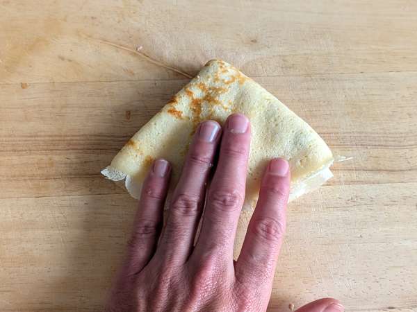 Crespelle mit Ricotta und Pilzen: das perfekte cremige vegetarische Rezept für jede Gelegenheit - Zubereitung Schritt 10