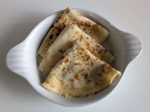 Crespelle mit Ricotta und Pilzen: das perfekte cremige vegetarische Rezept für jede Gelegenheit - Zubereitung Schritt 11