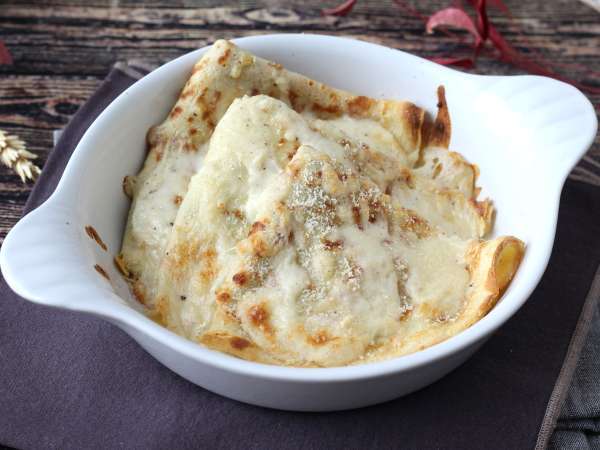 Crespelle mit Ricotta und Pilzen: das perfekte cremige vegetarische Rezept für jede Gelegenheit - Zubereitung Schritt 13