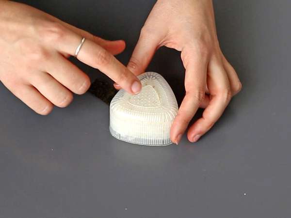 Onigiri mit kandierten Eigelben in Sojasauce - Zubereitung Schritt 8